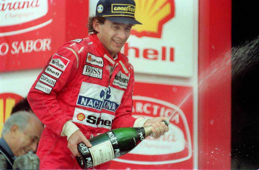 Ayrton Senna celebrating his victory at home